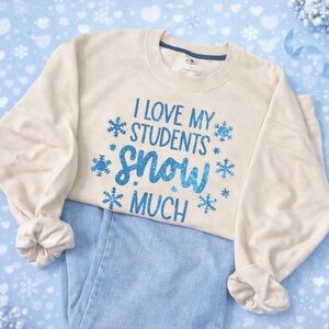 Cream Sweatshirt with Blue Snowflake Design